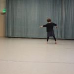 Naomi dancing in dance studio